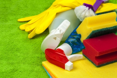 Supervisor reviewing health and safety procedures for cleaners
